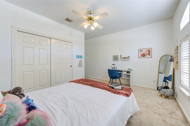 23742 Indian Hills Way, Katy, TX 77494 - bedroom with light carpet, a closet, and ceiling fan
