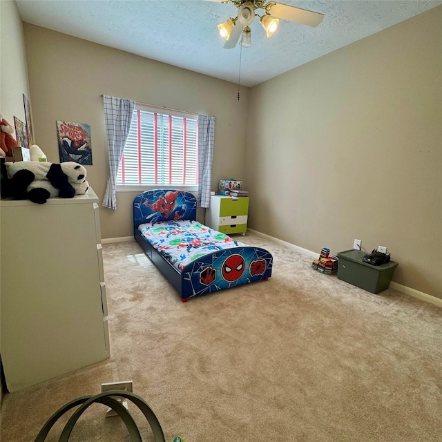 23742 Indian Hills Way, Katy, TX 77494 - bedroom featuring carpet, a textured ceiling, and ceiling fan