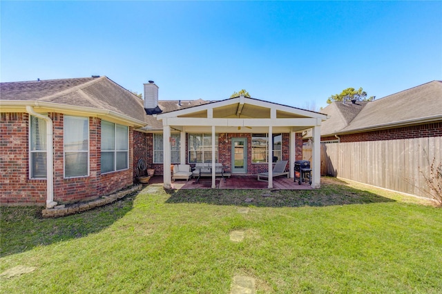 23742 Indian Hills Way, Katy, TX 77494 - rear view of property with brick siding, a chimney, outdoor lounge area, and a shingled roof