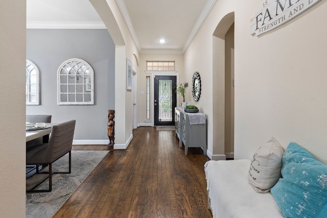 9523 Sapphire Hill Ln, Katy, TX 77494 - entrance foyer with arched walkways, wood finished floors, ornamental molding, and recessed lighting