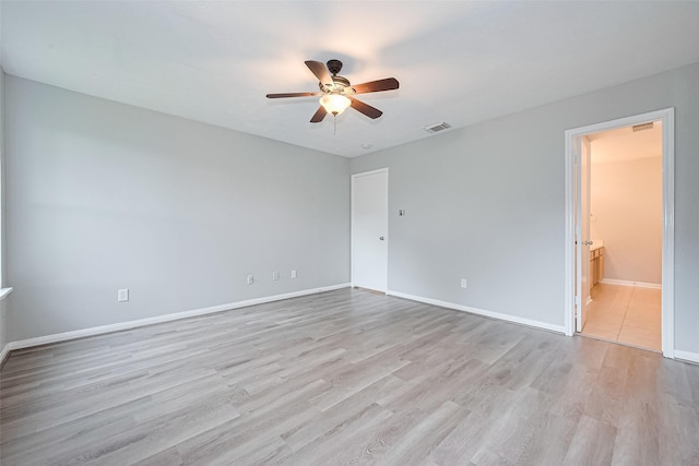 1811 Elm Shadow Dr, Missouri City, TX 77489 - empty room featuring ceiling fan and light wood-style flooring