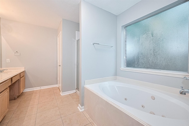 1811 Elm Shadow Dr, Missouri City, TX 77489 - bathroom with a whirlpool tub, vanity, tile patterned flooring, and a shower stall