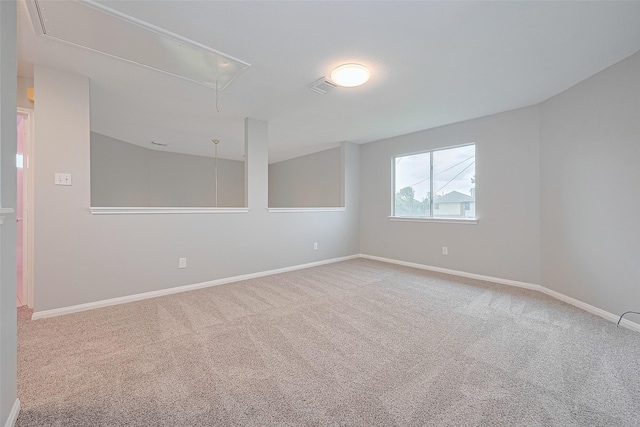 1811 Elm Shadow Dr, Missouri City, TX 77489 - carpeted spare room featuring attic access and baseboards