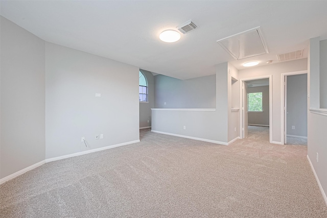 1811 Elm Shadow Dr, Missouri City, TX 77489 - empty room with attic access and light colored carpet