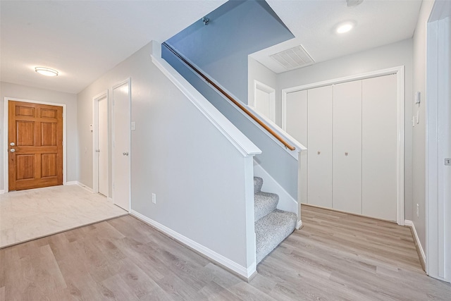 1811 Elm Shadow Dr, Missouri City, TX 77489 - foyer entrance with wood finished floors and stairs