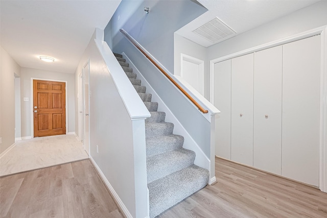 1811 Elm Shadow Dr, Missouri City, TX 77489 - stairs featuring wood finished floors