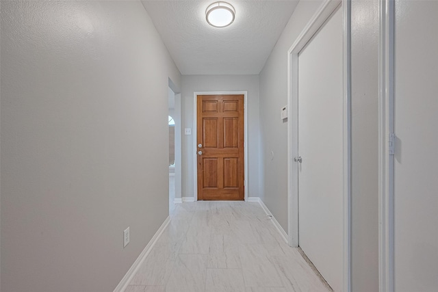 1811 Elm Shadow Dr, Missouri City, TX 77489 - doorway with baseboards and light marble finish flooring