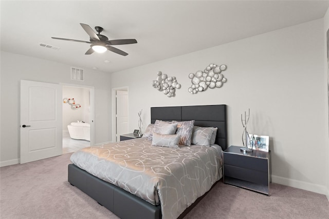 6804 Westview Dr Unit 1307, Houston, TX 77055 - bedroom featuring carpet flooring, connected bathroom, and a ceiling fan
