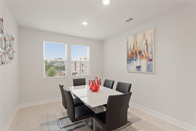 6804 Westview Dr Unit 1307, Houston, TX 77055 - dining room with recessed lighting and light wood-style flooring