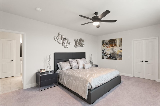 6804 Westview Dr Unit 1307, Houston, TX 77055 - carpeted bedroom with a closet and a ceiling fan