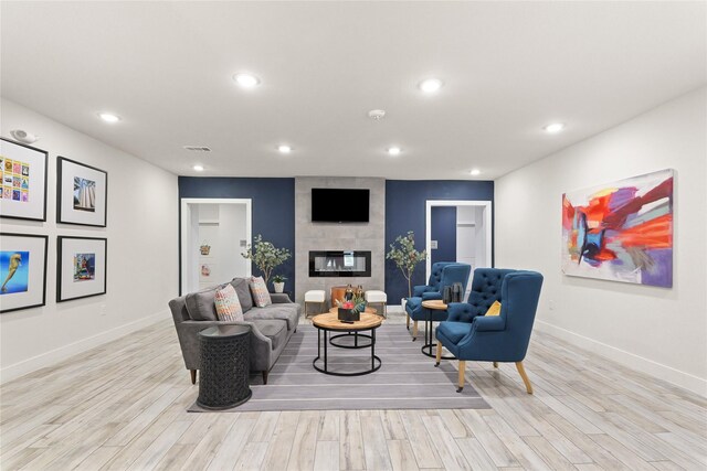 6804 Westview Dr Unit 1307, Houston, TX 77055 - living room featuring wood finished floors, recessed lighting, and a large fireplace