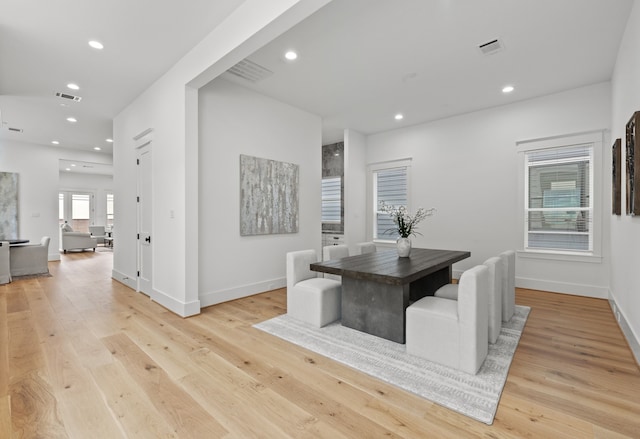 1313 Waverly St, Houston, TX 77008 - dining space with recessed lighting and light wood-style flooring