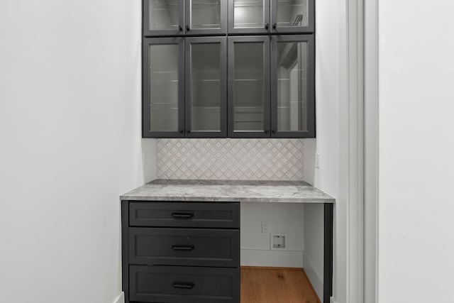 1313 Waverly St, Houston, TX 77008 - detailed view of decorative backsplash and wood finished floors