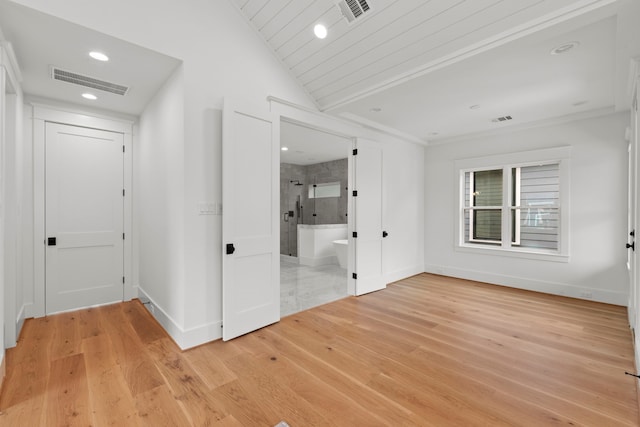1313 Waverly St, Houston, TX 77008 - unfurnished room with light wood-type flooring, recessed lighting, and vaulted ceiling