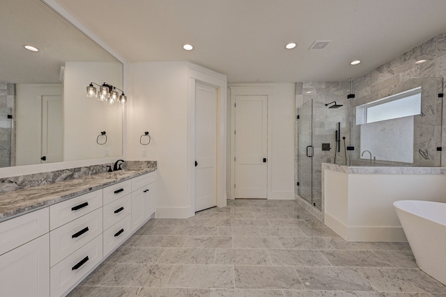 1313 Waverly St, Houston, TX 77008 - full bathroom featuring a stall shower, vanity, a freestanding bath, and recessed lighting