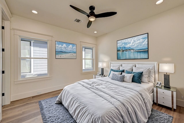 1313 Waverly St, Houston, TX 77008 - bedroom with light wood-style flooring, recessed lighting, and ceiling fan