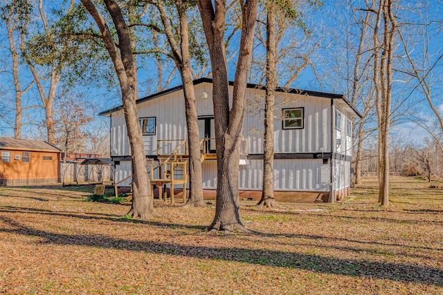 492 Trinity Rd, Dayton, TX 77535 - view of front of home with a front yard