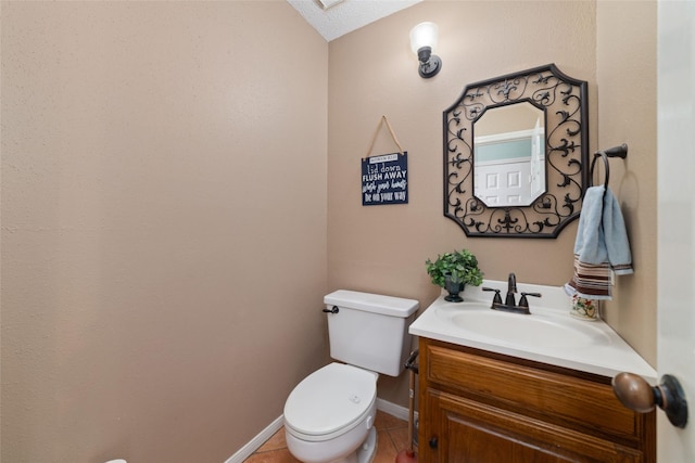 11303 Golden Ray Dr, Cypress, TX 77429 - half bathroom with vanity, a skylight, and tile patterned floors
