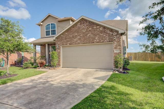 3502 Singing Flower Ln, Richmond, TX 77406 - traditional-style house with brick siding, driveway, an attached garage, and roof with shingles