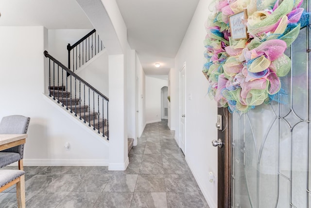 3502 Singing Flower Ln, Richmond, TX 77406 - entryway featuring arched walkways and stairs