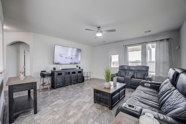 3502 Singing Flower Ln, Richmond, TX 77406 - living room with a ceiling fan and arched walkways