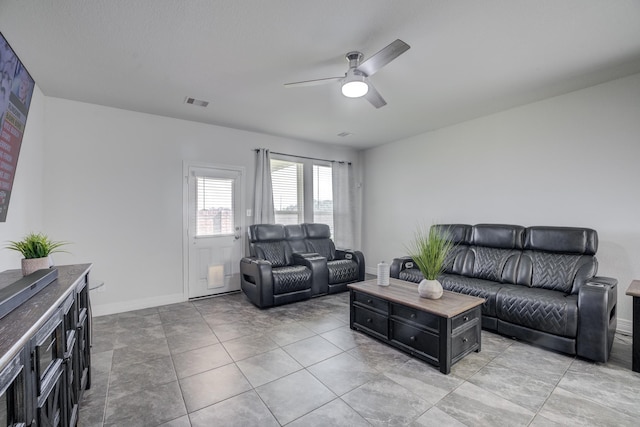 3502 Singing Flower Ln, Richmond, TX 77406 - living room featuring a ceiling fan and baseboards