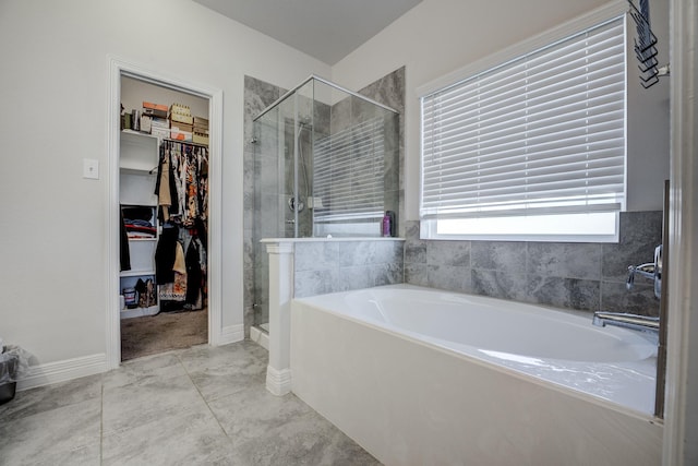 3502 Singing Flower Ln, Richmond, TX 77406 - full bath with a garden tub, a shower stall, and a spacious closet