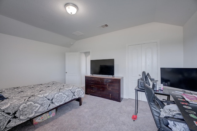 3502 Singing Flower Ln, Richmond, TX 77406 - carpeted bedroom with vaulted ceiling, a closet, and a desk