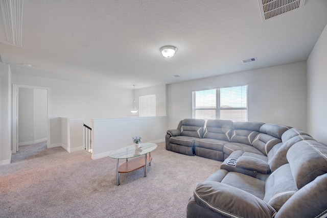 3502 Singing Flower Ln, Richmond, TX 77406 - carpeted living area featuring a textured ceiling and baseboards