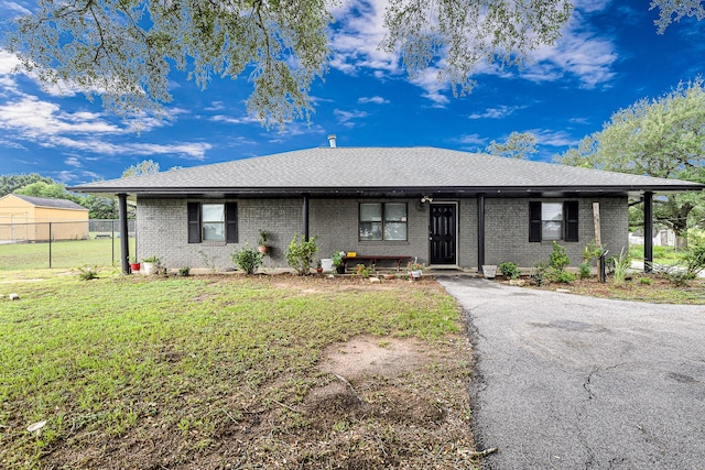 5673 Fm 1094th Rd, Sealy, TX 77474 - single story home with brick siding and roof with shingles