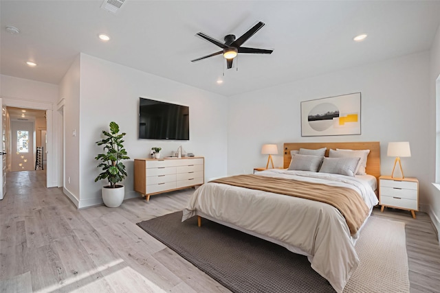6749 Liverpool St, Houston, TX 77021 - bedroom with light wood-type flooring, recessed lighting, and a ceiling fan