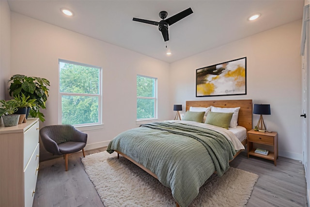 6749 Liverpool St, Houston, TX 77021 - bedroom with light wood-style floors, recessed lighting, and ceiling fan
