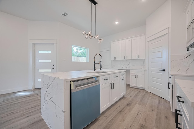 6749 Liverpool St, Houston, TX 77021 - kitchen featuring dishwasher, light wood-type flooring, tasteful backsplash, white cabinetry, and recessed lighting