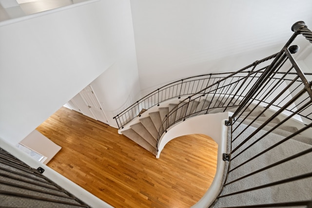 1016 Barkdull St, Houston, TX 77006 - stairway featuring wood finished floors