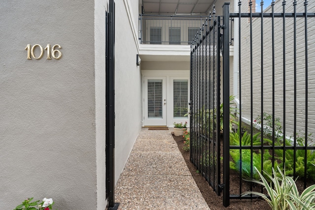 1016 Barkdull St, Houston, TX 77006 - view of exterior entry with a gate and french doors