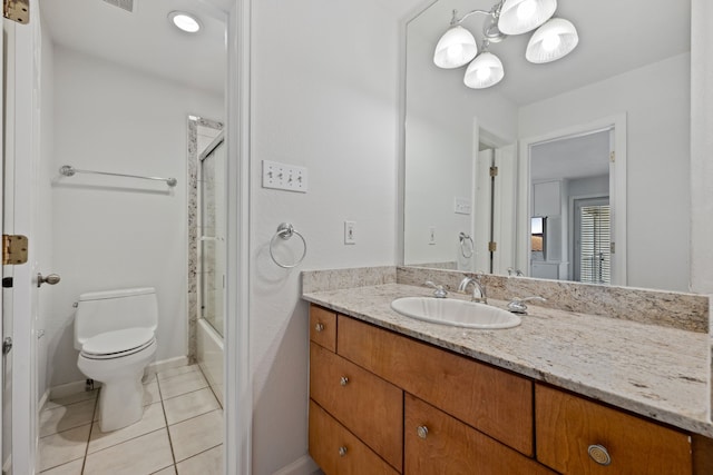 1016 Barkdull St, Houston, TX 77006 - full bath with vanity, tile patterned flooring, and shower / bath combination with glass door