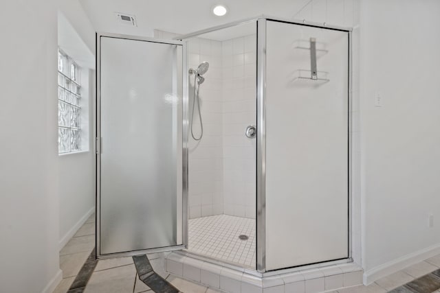 1016 Barkdull St, Houston, TX 77006 - full bathroom with a shower stall, tile patterned flooring, and recessed lighting