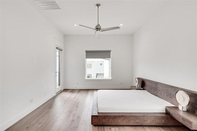 9805 Finch Falls Ln, Houston, TX 77080 - bedroom with wood finished floors, recessed lighting, and ceiling fan