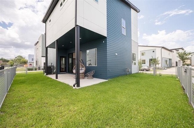 9805 Finch Falls Ln, Houston, TX 77080 - rear view of property featuring a patio and a fenced backyard