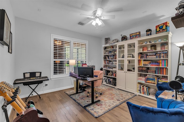 5523 Darschelle Dr, Houston, TX 77069 - home office with a ceiling fan and wood finished floors