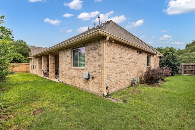 5523 Darschelle Dr, Houston, TX 77069 - view of side of property with brick siding and roof with shingles