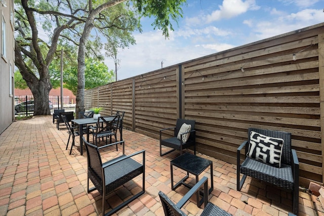 918 Detering St, Houston, TX 77007 - fenced backyard with a patio and outdoor dining space