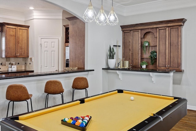 918 Detering St, Houston, TX 77007 - recreation room with arched walkways, billiards, crown molding, dark wood-style flooring, and recessed lighting
