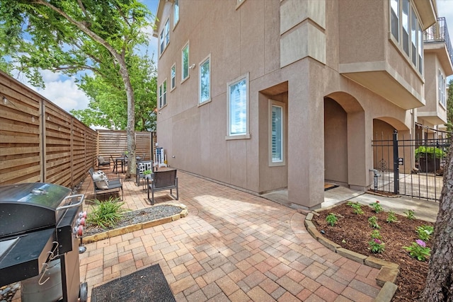 918 Detering St, Houston, TX 77007 - fenced backyard with a patio and a grill