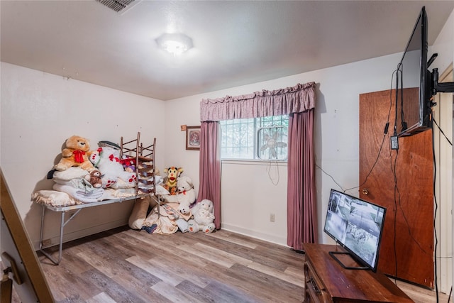 7726 Melanie St, Houston, TX 77016 - game room with wood finished floors