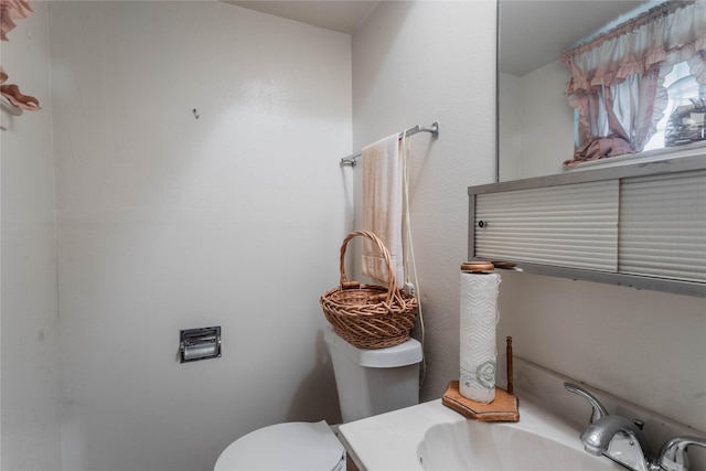 7726 Melanie St, Houston, TX 77016 - bathroom with toilet and vanity