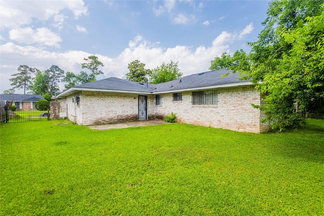 7726 Melanie St, Houston, TX 77016 - back of property with brick siding and a patio