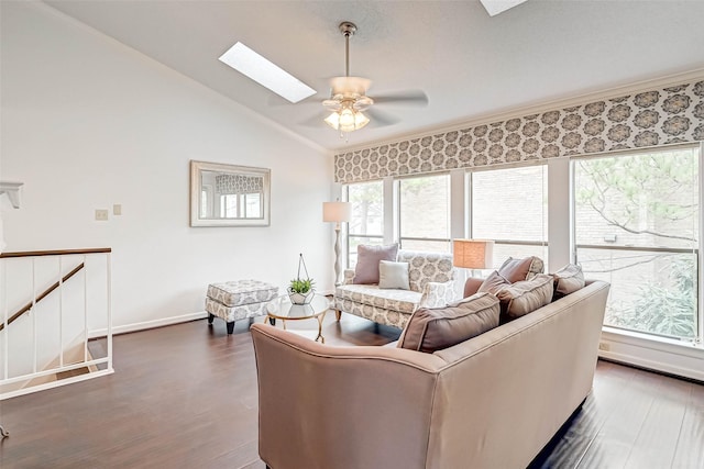 2277 S Kirkwood Rd Unit 906, Houston, TX 77077 - living area with a skylight, vaulted ceiling, dark wood-type flooring, a ceiling fan, and ornamental molding
