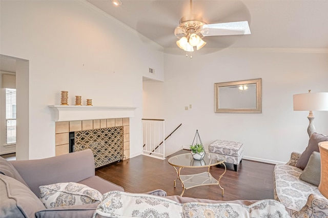 2277 S Kirkwood Rd Unit 906, Houston, TX 77077 - living room featuring lofted ceiling, wood finished floors, a ceiling fan, and a fireplace