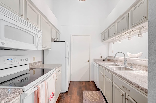 2277 S Kirkwood Rd Unit 906, Houston, TX 77077 - kitchen with white appliances, dark wood-type flooring, and light countertops